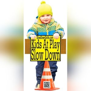 Oliver SlowDownDolls.com kids at play sign